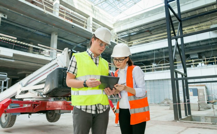 Industrial portrait of male and female construction engineers